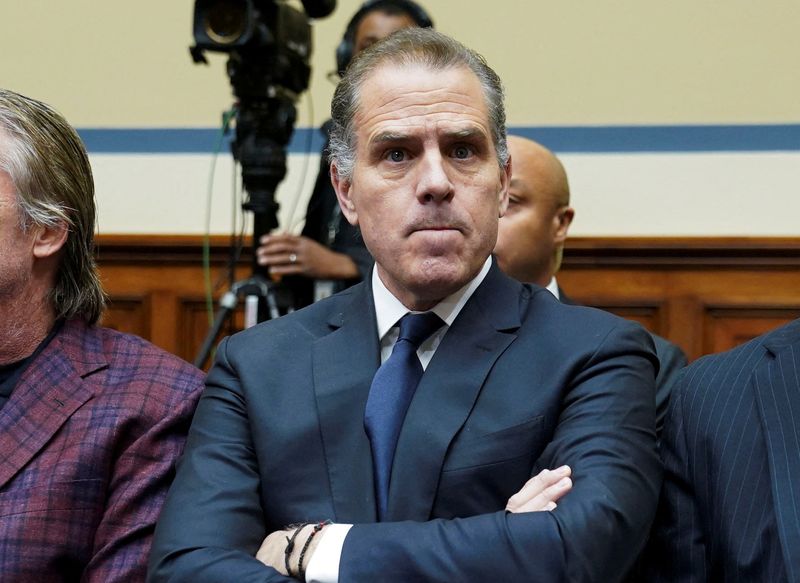 © Reuters. FILE PHOTO: Hunter Biden, son of U.S. President Joe Biden, is seen as he makes a surprise appearance at a House Oversight Committee markup and meeting to vote on whether to hold Biden in contempt of Congress for failing to respond to a request to testify to the House last month, on Capitol Hill in Washington, U.S., January 10, 2024. REUTERS/Kevin Lamarque/File Photo