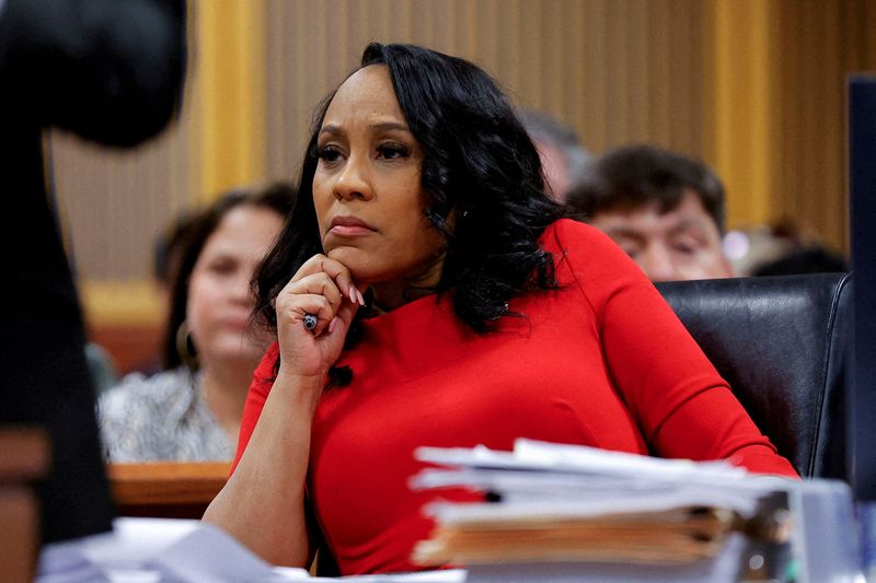 © Reuters. FILE PHOTO: Fulton County District Attorney Fani Willis attends a hearing on the Georgia election interference case, March 1, 2024, in Atlanta, Georgia, U.S. Alex Slitz/Pool via REUTERS/File Photo