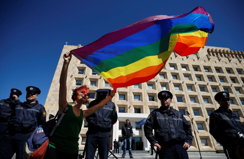 © Reuters. FILE PHOTO: LGBT activist attends a rally against Homophobia and Transphobia in Tbilisi, Georgia, May 17, 2017. REUTERS/David Mdzinarishvili/File Photo