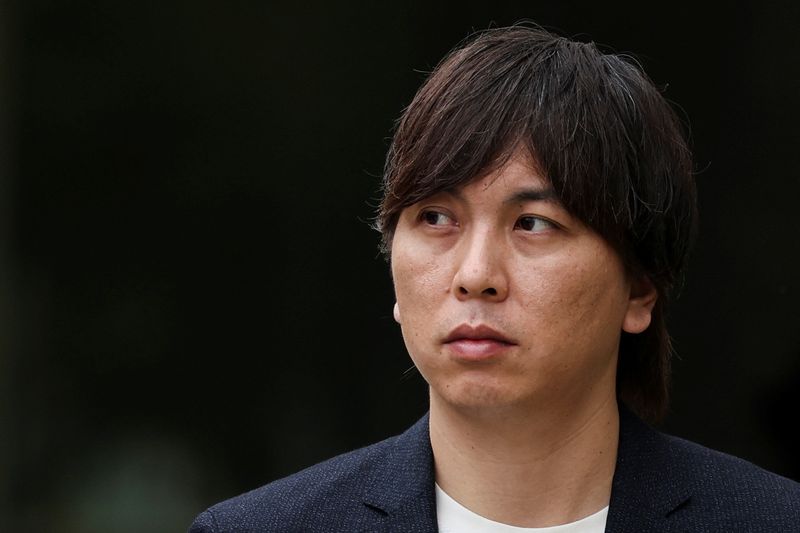 &copy; Reuters. Ippei Mizuhara, the former interpreter for Japanese baseball star Shohei Ohtani, walks outside the federal court in Santa Ana, California, U.S., June 4, 2024. REUTERS/Mike Blake