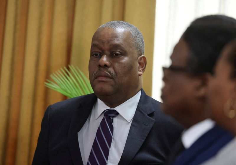 © Reuters. FILE PHOTO: Garry Conille attends a ceremony with members of the transition council where he is presented as Haiti's interim Prime Minister, in Port-au-Prince, Haiti June 3, 2024. REUTERS/Ralph Tedy Erol/File Photo