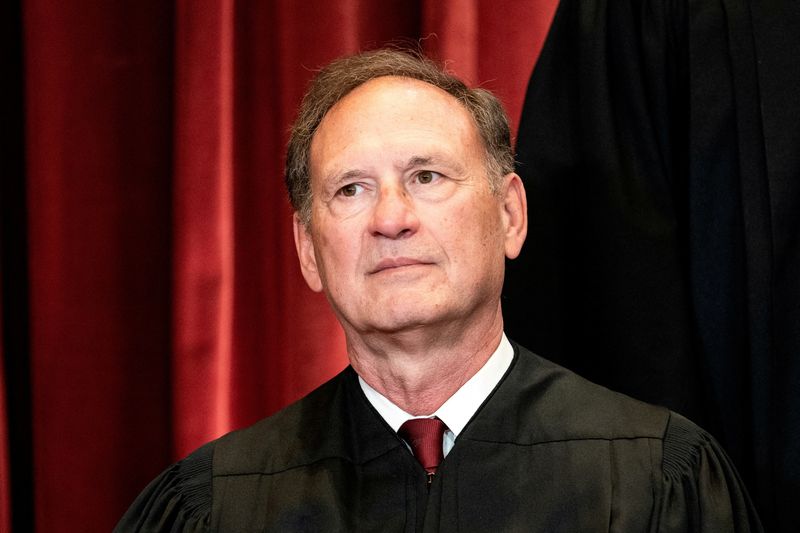 © Reuters. FILE PHOTO: Associate Justice Samuel Alito poses during a group photo of the Justices at the Supreme Court in Washington, U.S., April 23, 2021. Erin Schaff/Pool via REUTERS/File Photo