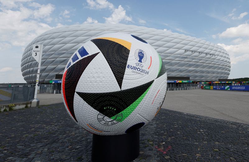© Reuters. FILE PHOTO: General view of a giant replica football outside Munich Football Arena ahead of Euro 2024 REUTERS/Michaela Stache/File Photo