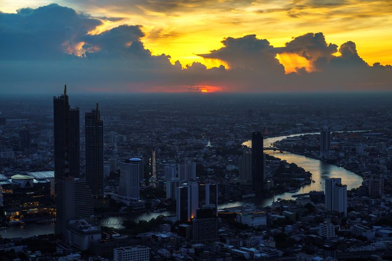 &copy; Reuters. FILE PHOTO: The skyline with Chao Phraya River is photographed during sunset in Bangkok, Thailand, June 2, 2021. REUTERS/Athit Perawongmetha/File Photo