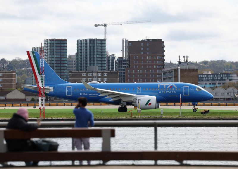 &copy; Reuters. People watch as an ITA Airways Airbus A220-100 takes off from London City Airport in London, Britain, April 11, 2024. REUTERS/Isabel Infantes/File Photo