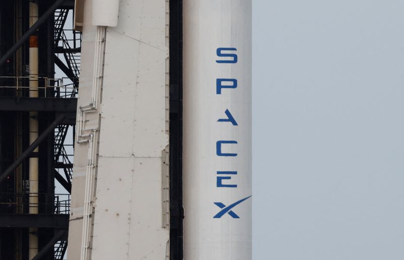 &copy; Reuters. The SpaceX logo is shown on a Falcon 9 rocket as it is prepared for launch to carry NASA's SpaceX Crew-8 astronauts Matthew Dominick, Michael Barratt, and Jeanette Epps, and Roscosmos cosmonaut Alexander Grebenkin to the International Space Station at the