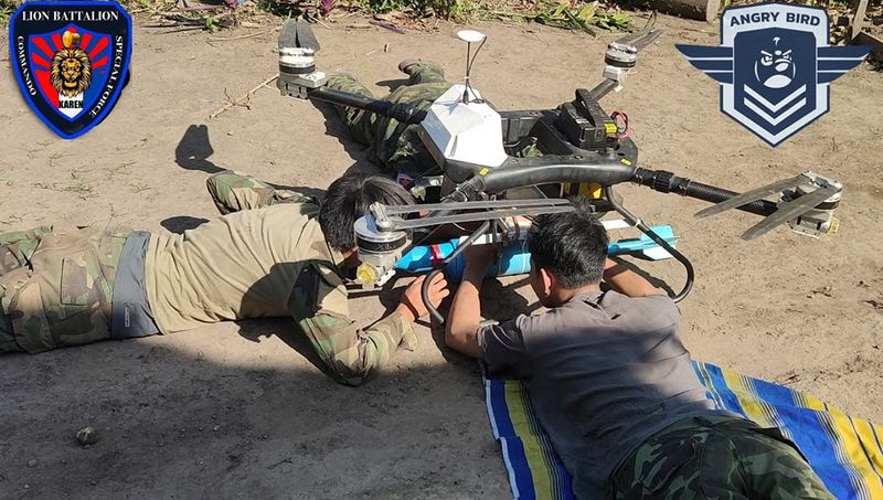 &copy; Reuters. People prepare a drop bomb attached to a drone at a workshop at an undisclosed location in Myanmar in this picture released on June 5, 2024. Angry Bird Drone Rangers/Handout via REUTERS  