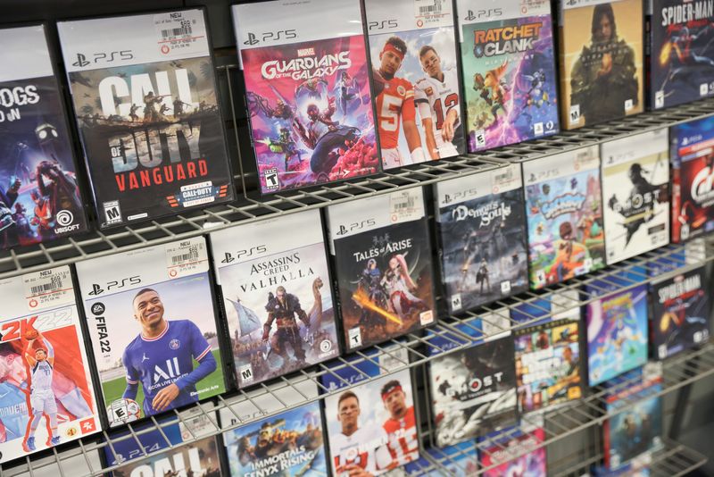 &copy; Reuters. FILE PHOTO: PS5 games by PlayStation are seen for sale at a GameStop in Manhattan, New York, U.S., December 7, 2021. REUTERS/Andrew Kelly