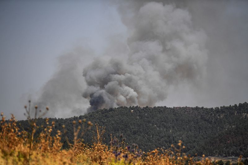 &copy; Reuters. Si vede del fumo a seguito di attacchi al confine provenienti dal Libano, in mezzo alle ostilità transfrontaliere in corso tra Hezbollah e le forze israeliane, vicino al confine israeliano con il Libano, sul lato di Israele, il 13 giugno 2024. REUTERS/Gi