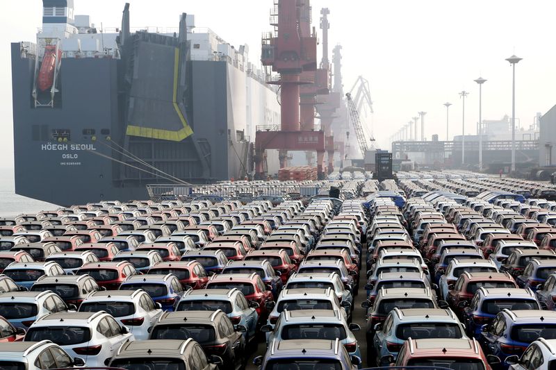 &copy; Reuters. Cars for export wait to be loaded onto a cargo vessel at a port in Lianyungang, Jiangsu province, China November 9, 2019. REUTERS/Stringer/File Photo