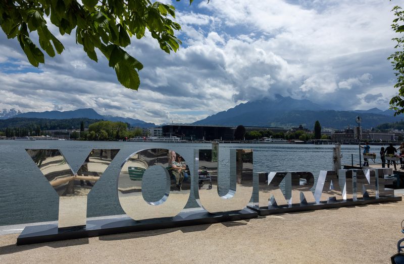 © Reuters. A sign is displayed in front of the Buergenstock Resort ahead of the Summit on Peace in Ukraine near Lucerne, Switzerland, June 14, 2024. REUTERS/Denis Balibouse