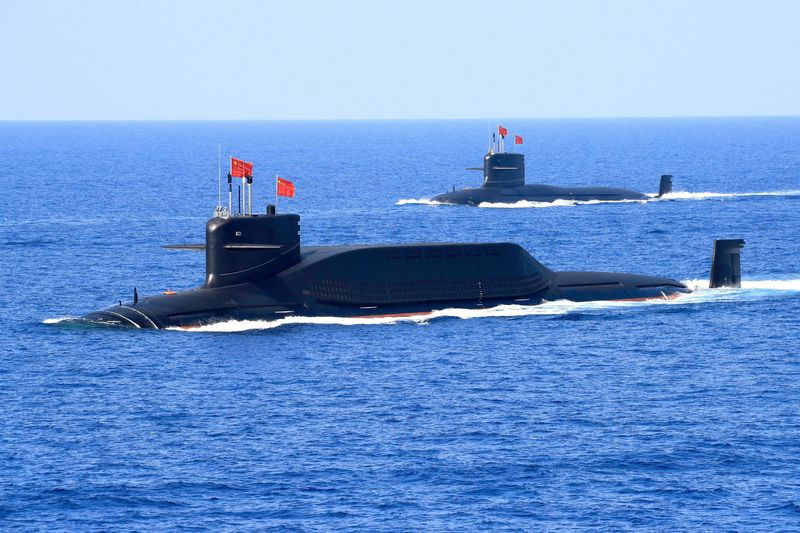 © Reuters. FILE PHOTO: A nuclear-powered Type 094A Jin-class ballistic missile submarine of the Chinese People's Liberation Army (PLA) Navy is seen during a military display in the South China Sea April 12, 2018. Picture taken April 12, 2018. REUTERS/Stringer/File Photo