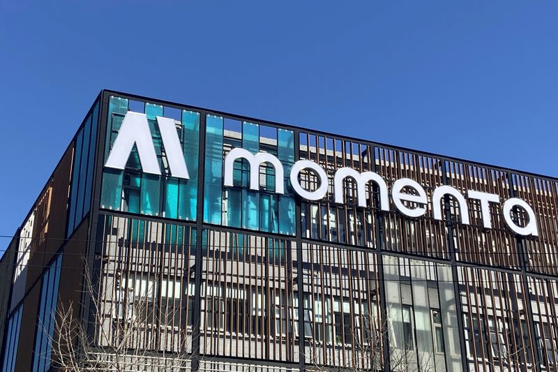 &copy; Reuters. The company logo of Chinese autonomous driving startup Momenta is seen on the facade of its office building in Beijing, China March 13, 2020. Picture taken March 13, 2020. REUTERS/Yilei Sun/ File Photo