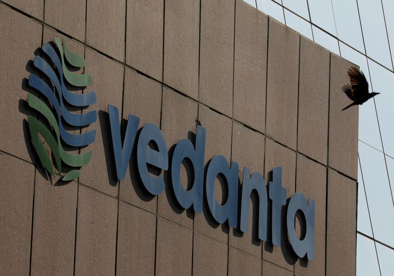 &copy; Reuters. FILE PHOTO: A bird flies past the logo of Vedanta installed on the facade of its headquarters in Mumbai, India January 31, 2018. REUTERS/Danish Siddiqui/File Photo