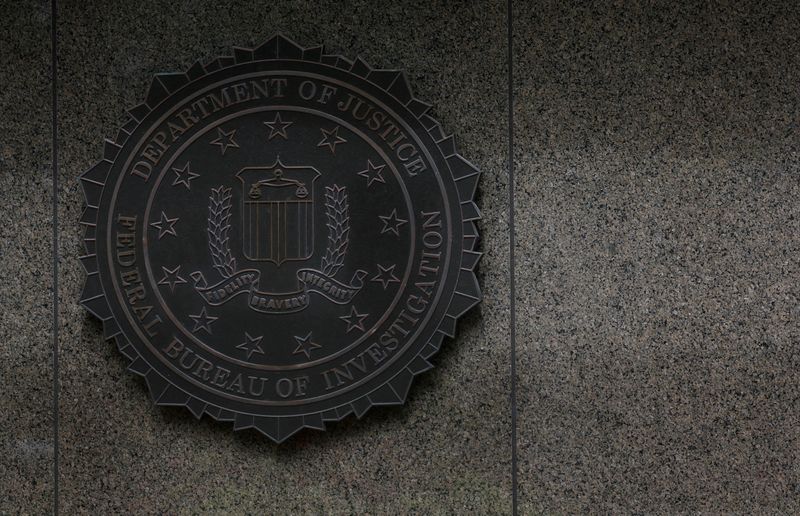 © Reuters. FILE PHOTO: A view shows a sign on J. Edgar Hoover FBI building in Washington, D.C., U.S., August 17, 2022. REUTERS/Leah Millis//File Photo