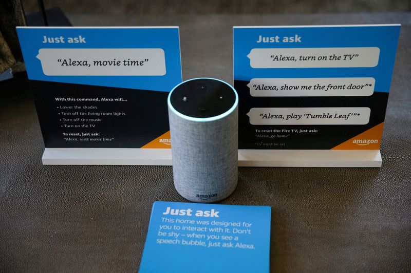 &copy; Reuters. FILE PHOTO: Prompts on how to use Amazon's Alexa personal assistant are seen alongside an Amazon Echo in an Amazon ?experience center?  in Vallejo, California, U.S., May 8, 2018. Picture taken on May 8, 2018. REUTERS/Elijah Nouvelage/File Photo