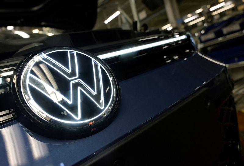 &copy; Reuters. FILE PHOTO: Volkswagen logo is illuminated on a production line for the Golf VIII and Tiguan cars at the VW headquarters in Wolfsburg, Germany May 23, 2024. REUTERS/Fabian Bimmer/File Photo