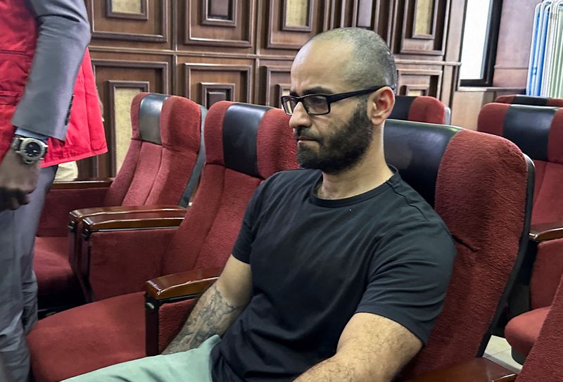 © Reuters. FILE PHOTO: Tigran Gambaryan, an executive of Binance, the world's largest cryptocurrency exchange, sits as he waits to face prosecution for tax evasion and money laundering at the federal high court in Abuja, Nigeria April 4, 2024. REUTERS/ Abraham Achirga/File Photo