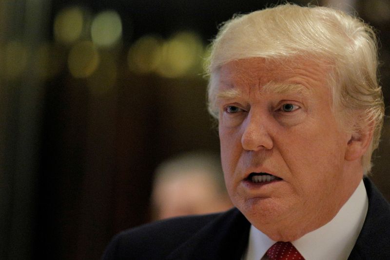 © Reuters. FILE PHOTO: U.S. President-elect Donald Trump speaks to members of the press at Trump Tower in Manhattan, New York City, U.S., December 6, 2016.  REUTERS/Brendan McDermid/File Photo