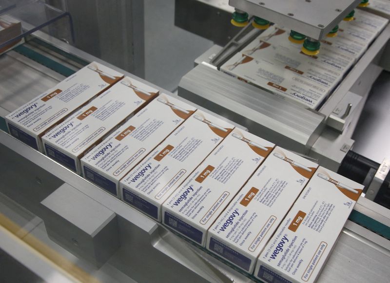 © Reuters. FILE PHOTO: Boxes of Wegovy move along a packaging line at Novo Nordisk's facility in Hillerod, Denmark, March 8, 2024. REUTERS/Tom Little/File Photo