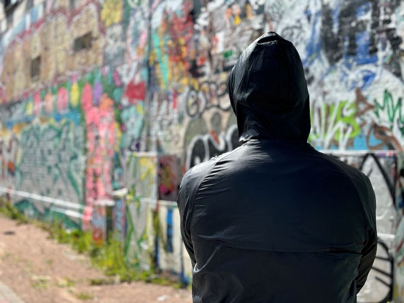 © Reuters. FILE PHOTO: Yayha, a former gang criminal who declined to give his last name or show his face, stands in Gothenburg, Sweden June 13, 2024. REUTERS/Johan Ahlander/File photo