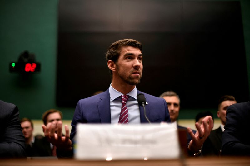 &copy; Reuters. FILE PHOTO: Olympic gold medalist Michael Phelps testifies before the House Oversight and Investigations Subcommittee about anti-doping policy in international sport, in Washington February 28, 2017. REUTERS/James Lawler Duggan/File Photo