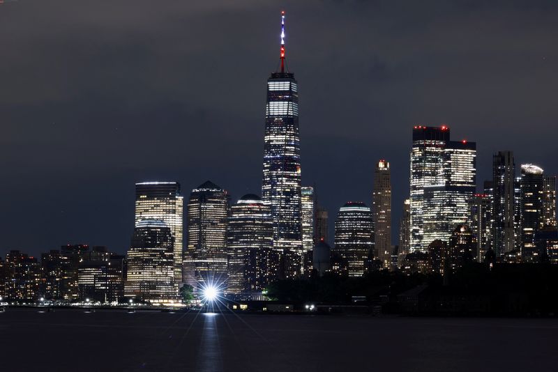 &copy; Reuters. FILE PHOTO: A long exposure picture shows the One World Trade Center building peaking through the Manhattan skyline, as seen from Jersey City, New Jersey, U.S., July 3, 2023. REUTERS/Amr Alfiky/File Photo