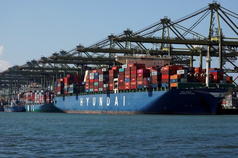 &copy; Reuters. FILE PHOTO: Container ships are berthed at PSA's Pasir Panjang Terminal in Singapore July 15, 2019.  Picture taken July 15, 2019.  REUTERS/Edgar Su/File Photo