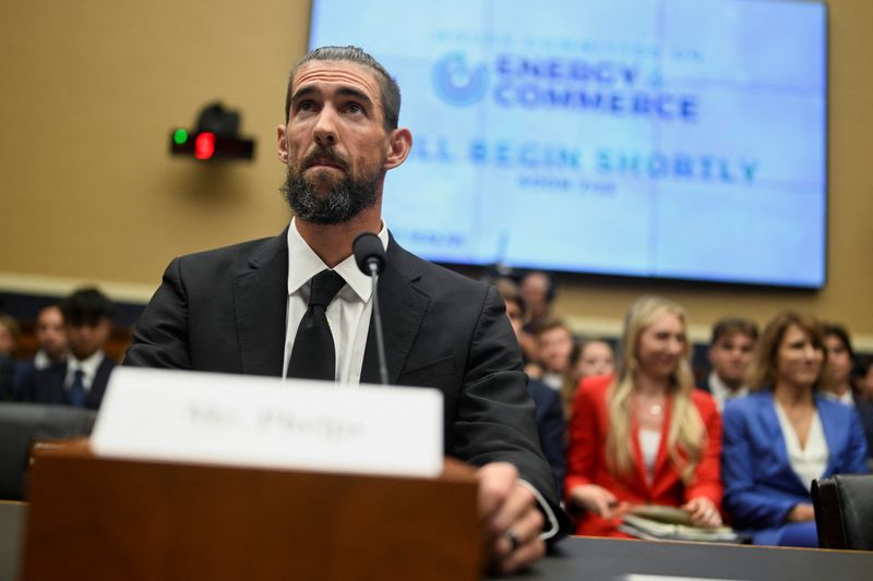 © Reuters. Olympic swimming great Michael Phelps attends a House Energy and Commerce Oversight and Investigations Subcommittee hearing on anti-doping measures ahead of the 2024 Olympics in Paris, at Capitol Hill in Washington, U.S., June 25, 2024. REUTERS/Craig Hudson