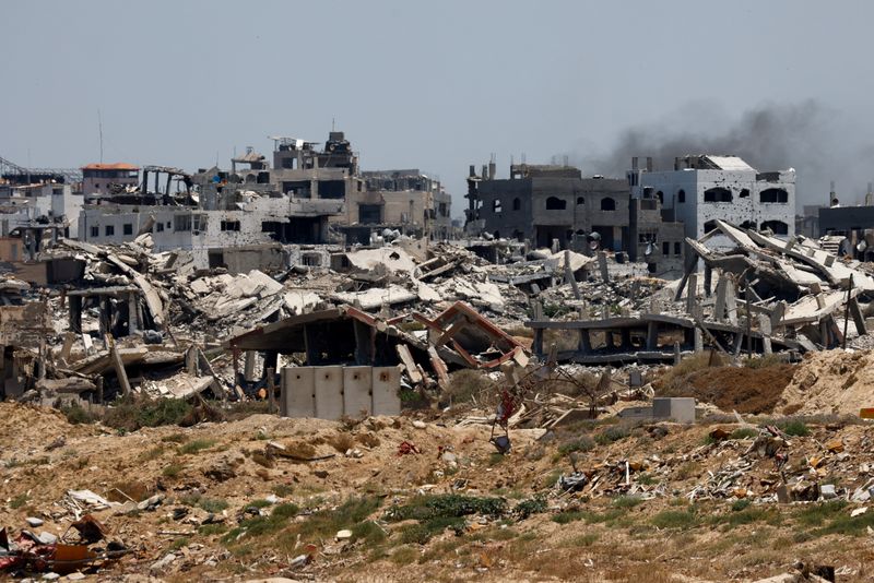 © Reuters. FILE PHOTO: Destroyed buildings are pictured in Gaza, amid the ongoing conflict between Israel and Hamas, as seen near the Gaza coast, June 25, 2024. REUTERS/Amir Cohen/File Photo