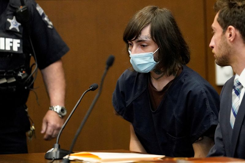 © Reuters. FILE PHOTO: Robert E. Crimo III answers to Judge Victoria A. Rossetti during a hearing in Lake County court, in Waukegan, Illinois, U.S., August 3, 2022. Nam Y. Huh/Pool via REUTERS/File Photo