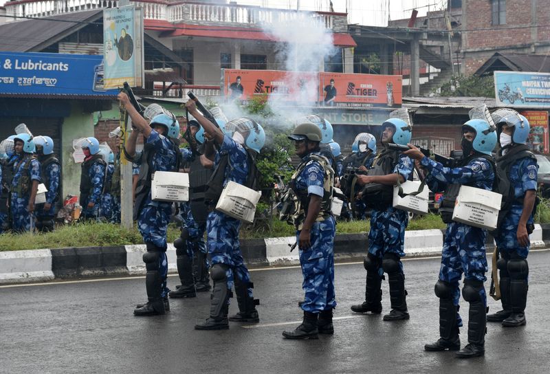 &copy; Reuters. FILE PHOTO: Riot police officers fire tear smoke shells to disperse demonstrators protesting against the arrest of five people, who police said were carrying weapons while wearing camouflage uniform, in Imphal, Manipur, India, September 18, 2023. REUTERS/