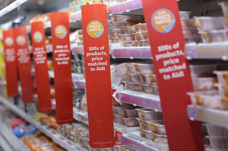 © Reuters. FILE PHOTO: Signage is seen on food shelves inside a Sainsbury?s supermarket in Richmond, West London, in London, Britain February 21, 2024. REUTERS/Isabel Infantes/File Photo