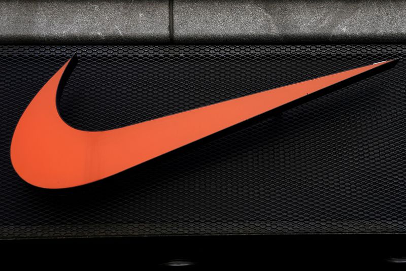 © Reuters. FILE PHOTO: The Nike swoosh logo is pictured on a store in New York City, New York, U.S., September 4, 2018. REUTERS/Carlo Allegri/File Photo