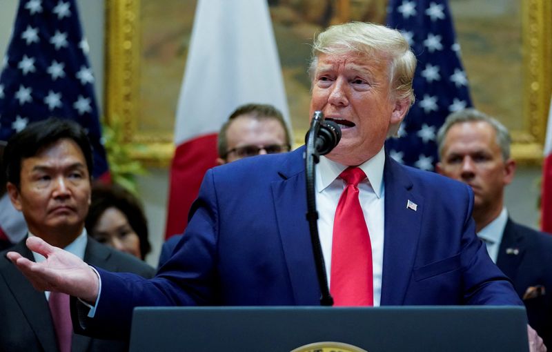 © Reuters. FILE PHOTO: U.S. President Donald Trump speaks during a formal signing ceremony for the U.S.-Japan Trade Agreement at the White House in Washington, October 7, 2019.  REUTERS/Kevin Lamarque/File Photo