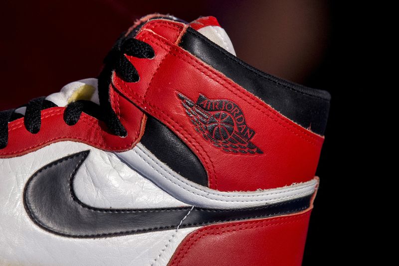 &copy; Reuters. FILE PHOTO: The famous Nike swoosh and Air Jordan logo is seen on an Air Jordan 1, called "Notorious" released from 1984-1985, during a preview for "The Rise of the Sneaker Culture" exhibit at the Brooklyn Museum in the Brooklyn borough of New York, July 