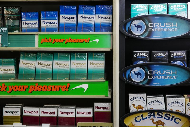&copy; Reuters. FILE PHOTO: Newport and Camel cigarettes are stacked on a shelf inside a tobacco store in New York July 11, 2014.  REUTERS/Lucas Jackson/File Photo