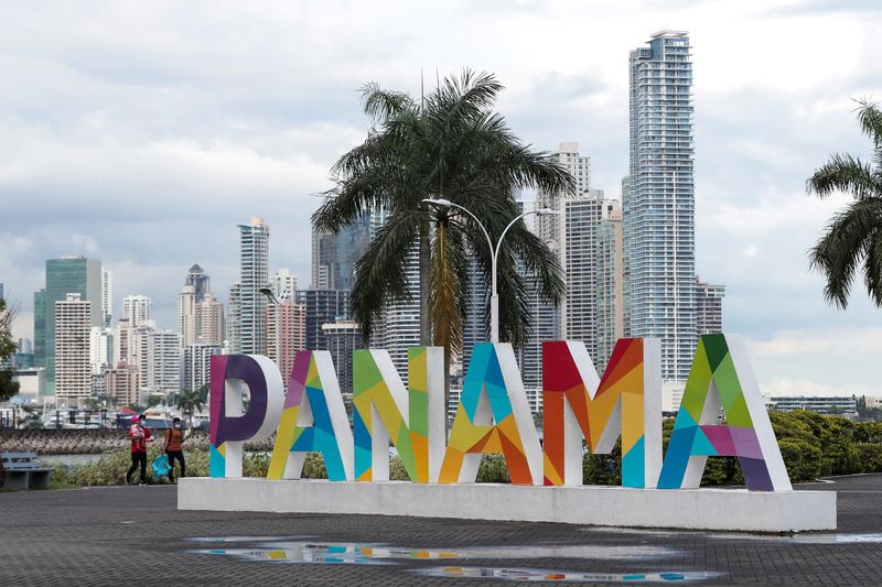 © Reuters. FILE PHOTO: A Panama sign is seen at a photographic parador with the skyline of the city in the background, in Panama City, Panama October 4, 2021. REUTERS/Erick Marciscano/File Photo