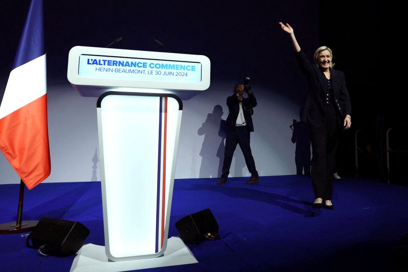 &copy; Reuters. FILE PHOTO: Marine Le Pen, French far-right leader and far-right Rassemblement National (National Rally - RN) party candidate, reacts on stage after partial results in the first round of the early French parliamentary elections in Henin-Beaumont, France, 