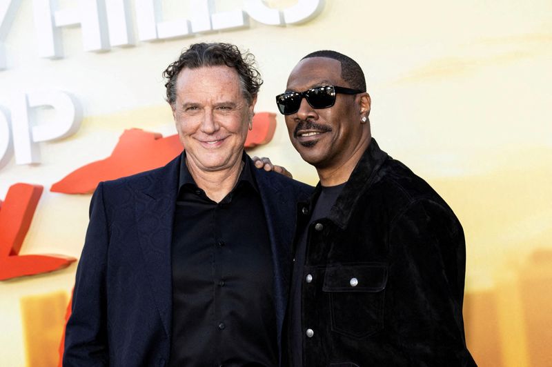 &copy; Reuters. FILE PHOTO: Judge Reinhold and Eddie Murphy attend the World premiere of "Beverly Hills Cop: Axel F" at the Wallis Annenberg Center for the Performing Arts in Beverly Hills, California, U.S. June 20, 2024.  REUTERS/Aude Guerrucci/File Photo