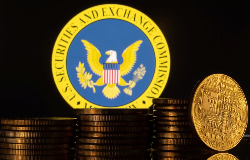 © Reuters. FILE PHOTO: U.S. Securities and Exchange Commission logo and representations of cryptocurrency are seen in this illustration taken June 6, 2023. REUTERS/Dado Ruvic/Illustration/File Photo