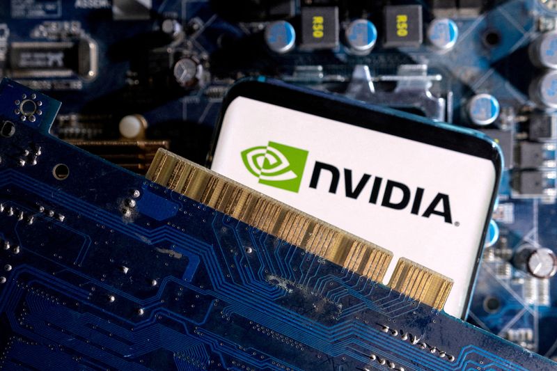 &copy; Reuters. FILE PHOTO: A smartphone with a displayed NVIDIA logo is placed on a computer motherboard in this illustration taken March 6, 2023. REUTERS/Dado Ruvic/Illustration/File Photo/File Photo