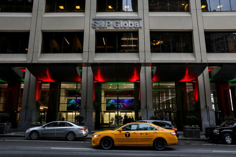 &copy; Reuters. FILE PHOTO: The S&P Global logo is displayed on its offices in the financial district in New York City, U.S., December 13, 2018. REUTERS/Brendan McDermid/File Photo