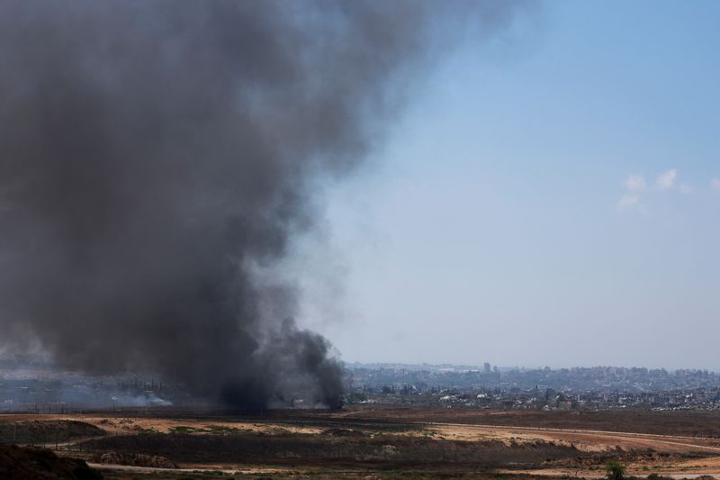© Reuters. Smoke rises from Gaza, amid the ongoing conflict between Israel and Hamas, as seen from Israel, July 2, 2024. REUTERS/Ammar Awad