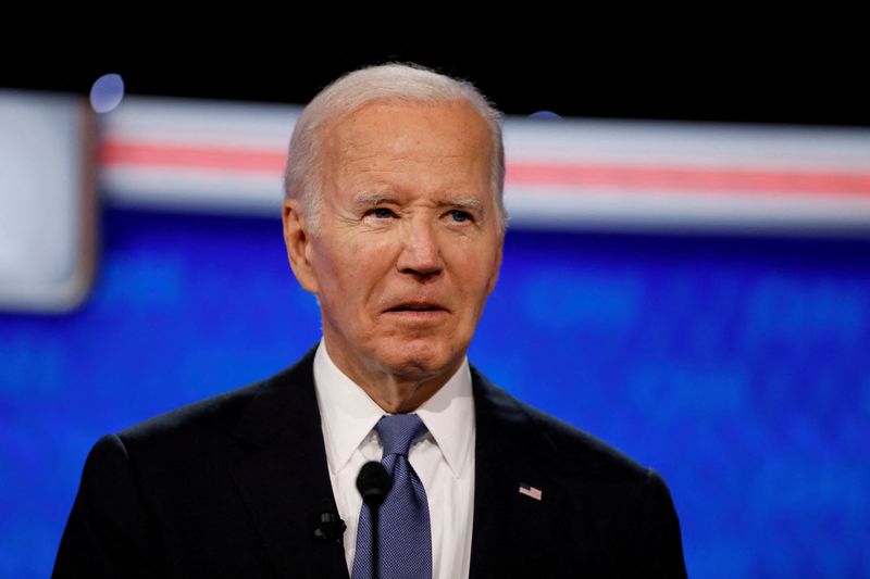 © Reuters. FILE PHOTO: U.S. President Joe Biden attends the first presidential debate hosted by CNN in Atlanta, Georgia, U.S., June 27, 2024. REUTERS/Marco Bello/File Photo