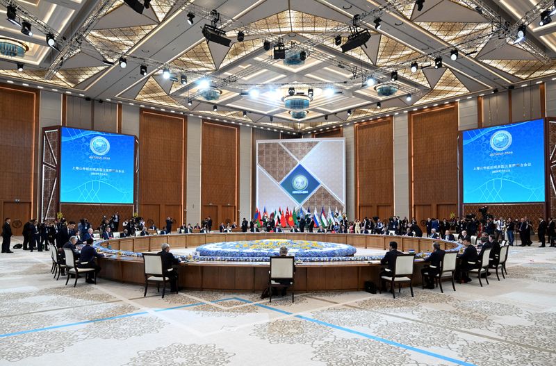 © Reuters. Leaders sit at the table during Shanghai Cooperation Organization summit in Astana, Kazakhstan July 4, 2024. Sultan Dosaliev/Kyrgyz Presidential Press Service/Handout via REUTERS
