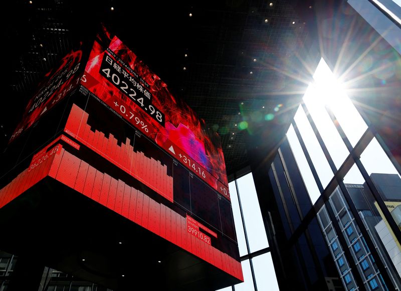 &copy; Reuters. An electronic screen displaying Japan's Nikkei share average is pictured in Tokyo, Japan March 4, 2024. REUTERS/Kim Kyung-Hoon/File Photo 