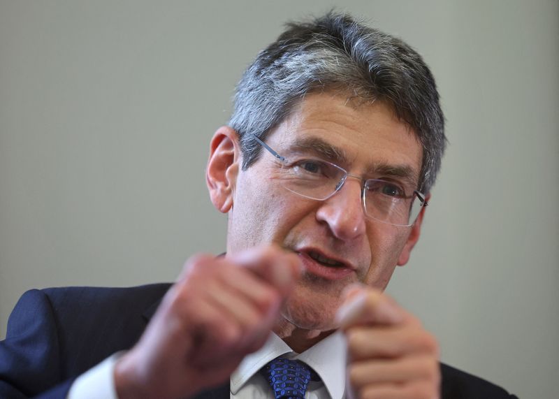 © Reuters. FILE PHOTO: Jonathan Haskel, Bank of England Monetary Policy Committee member, gestures during an interview with Reuters at the Bank of England in London, Britain, February 8, 2024. REUTERS/Toby Melville/File Photo