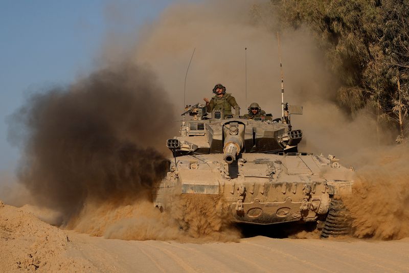 &copy; Reuters. An Israeli tank manoeuvres, amid the Israel-Hamas conflict, near the Israel-Gaza border, in Israel, July 8, 2024. REUTERS/Amir Cohen