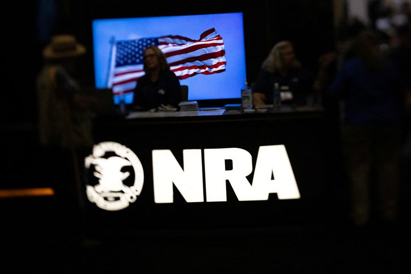 &copy; Reuters. A National Rifle Association (NRA) logo is displayed at the NRA annual national convention in Dallas, Texas, U.S., May 18, 2024. REUTERS/Carlos Barria/File Photo